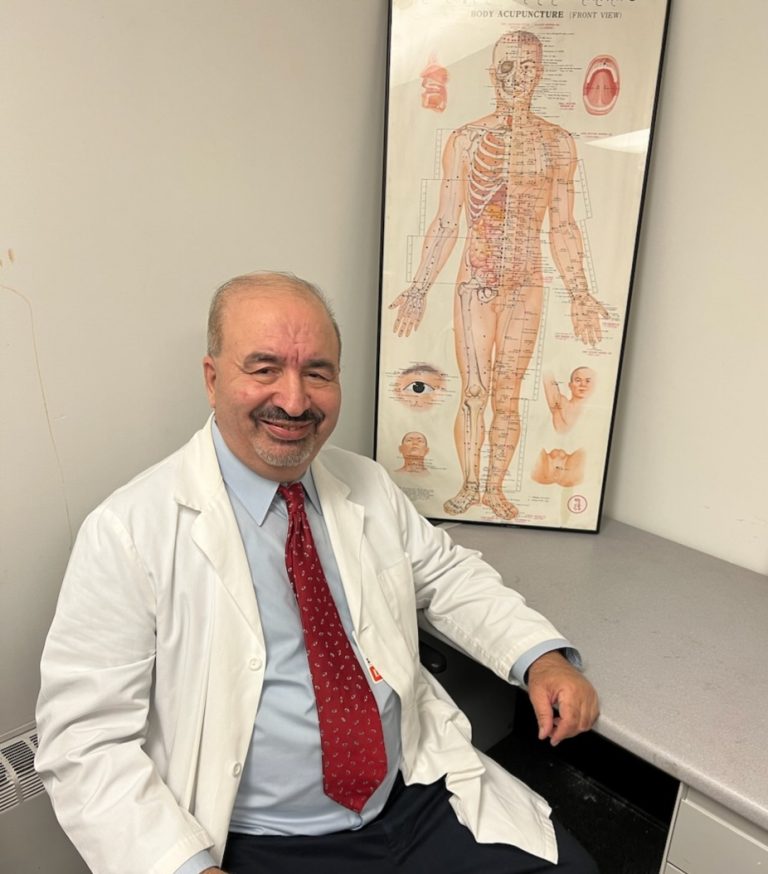 dr tavakoli in his office